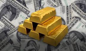 Gold bars on US dollar bills - Gold Holds Near Historic Highs June 3, 2026